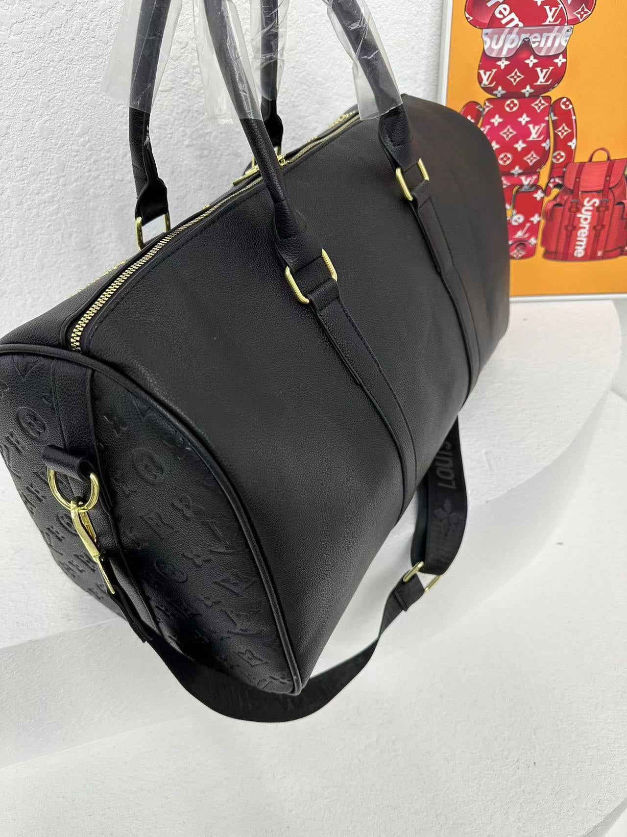 Louis vuitton handbag ( weekender / traveling bag)