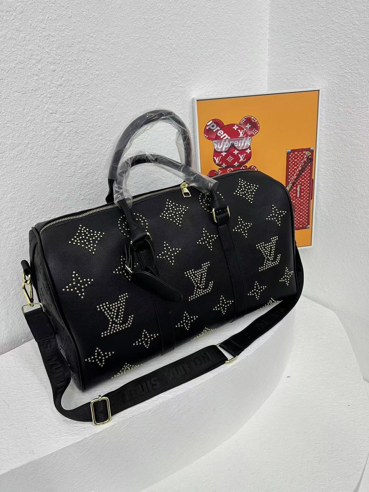 Louis vuitton handbag ( weekender / traveling bag)