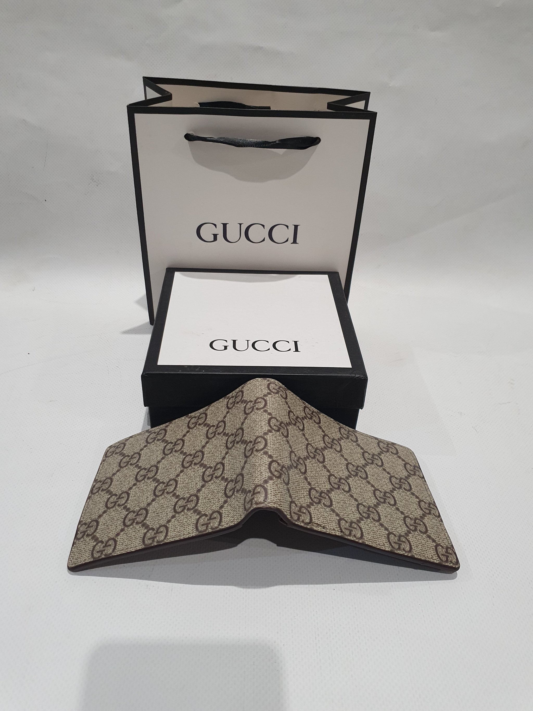 Gucci wallet men price online