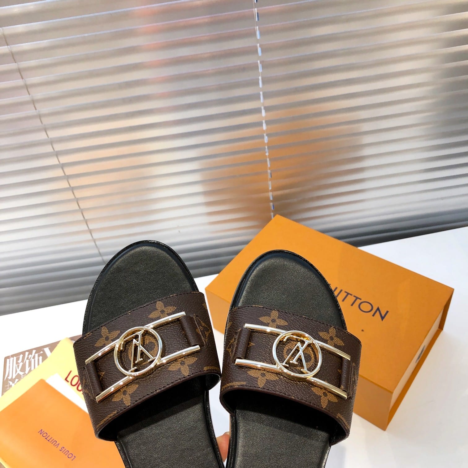 Louis Vuitton Lock It Flat Mules Sandals