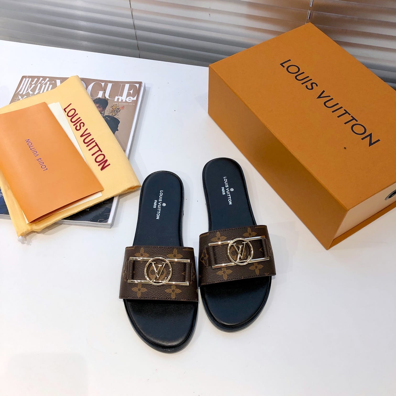 Louis Vuitton Lock It Flat Mules Sandals